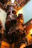 A carved wooden spiral staircase inside the castle ___.jpg