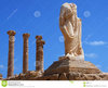 Ruins Of Sabratha, Libya - Colonnade And Statue Stock ___.jpg