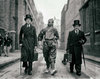 Vintage creepy photo print poster men walking in top hats with.jpg