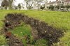 Coffin-shaped Sinkholes Swallow Graves in Gravesend Cemetery.jpg